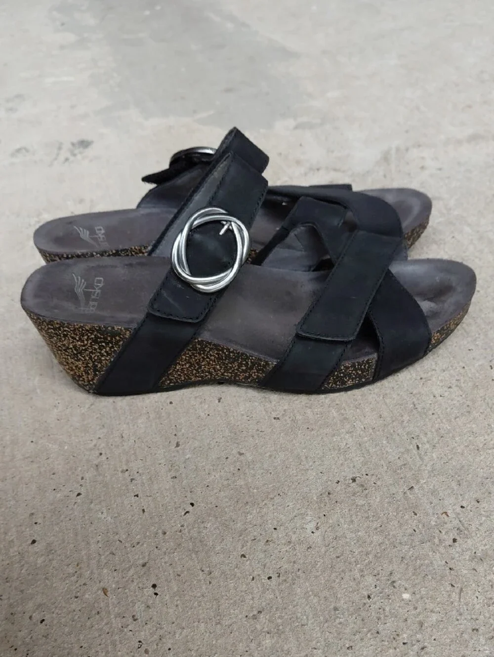 Dansko Black Leather Wedge Sandals with Cork-Textured Heel